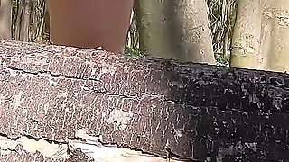 Beautiful Woman Undressing and Walking Nude with a Clit Pump Outdoors in a Public Forest