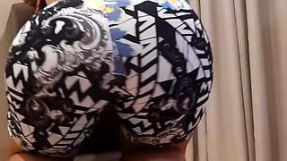 Twerking in gym shorts and juggling his backside on